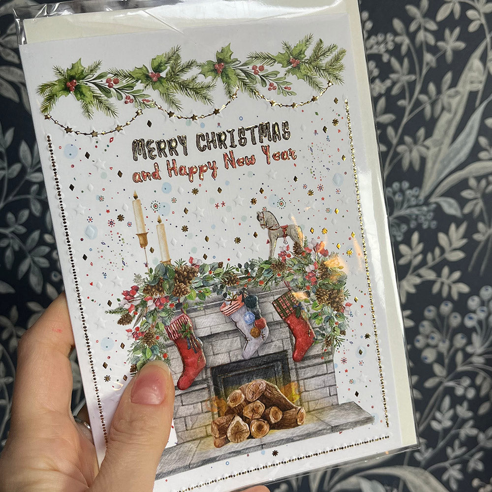 Christmas greeting cards with embossed details and metallic paint, various subjects