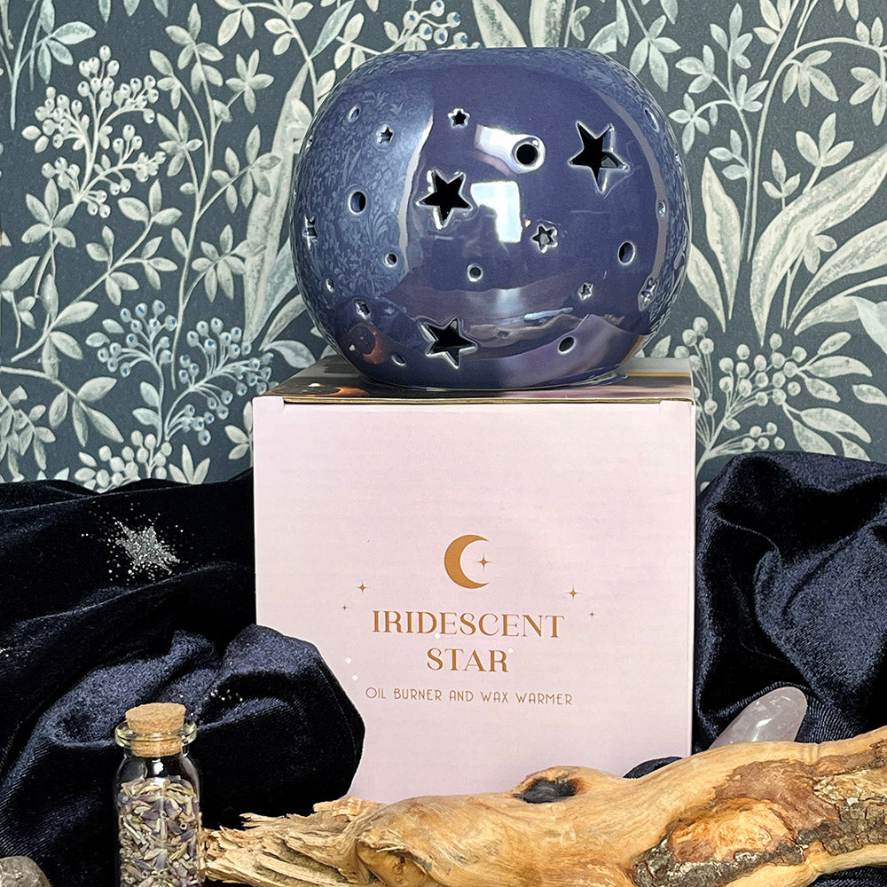 Decorative oil burning sphere, iridescent purple, star projecting lantern, witchy vibes