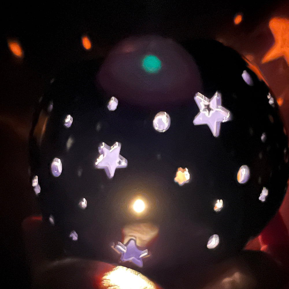 Decorative oil burning sphere, iridescent purple, star projecting lantern, witchy vibes