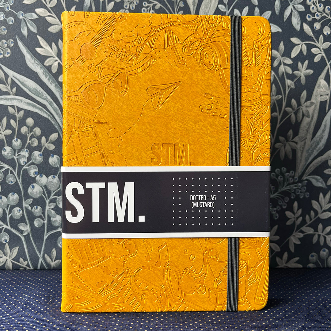 bullet journal STM, formato A5, con elastico e pagine puntinate, colori vari. Copertina in pelle vegana