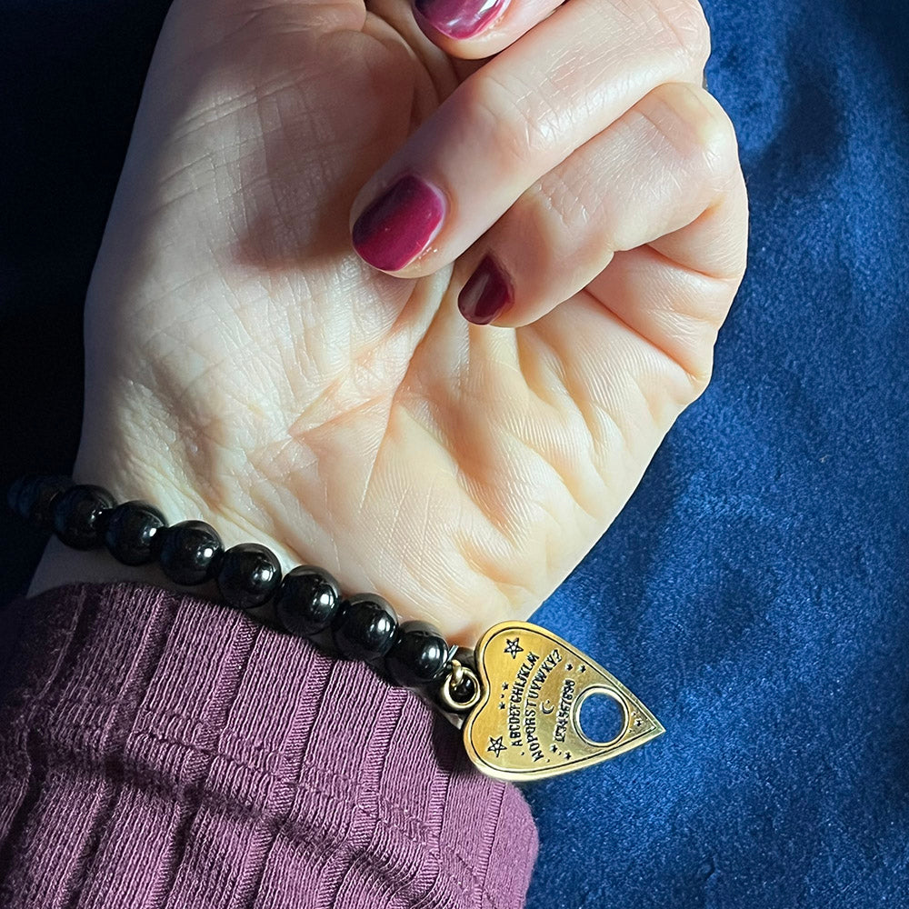 Braccialetto di perle nere con ciondolo tavola OUIJA