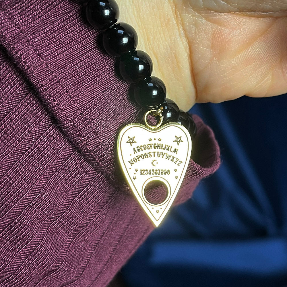 Braccialetto di perle nere con ciondolo tavola OUIJA