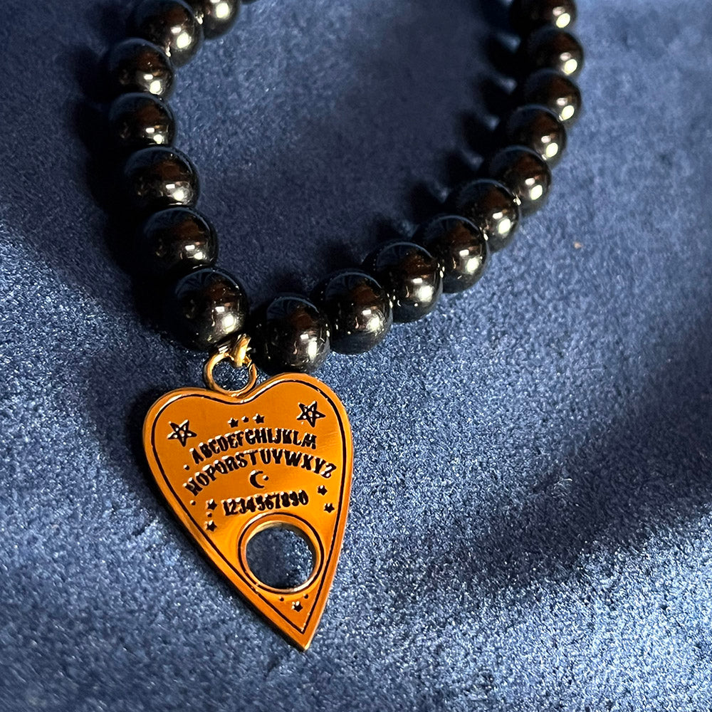Braccialetto di perle nere con ciondolo tavola OUIJA